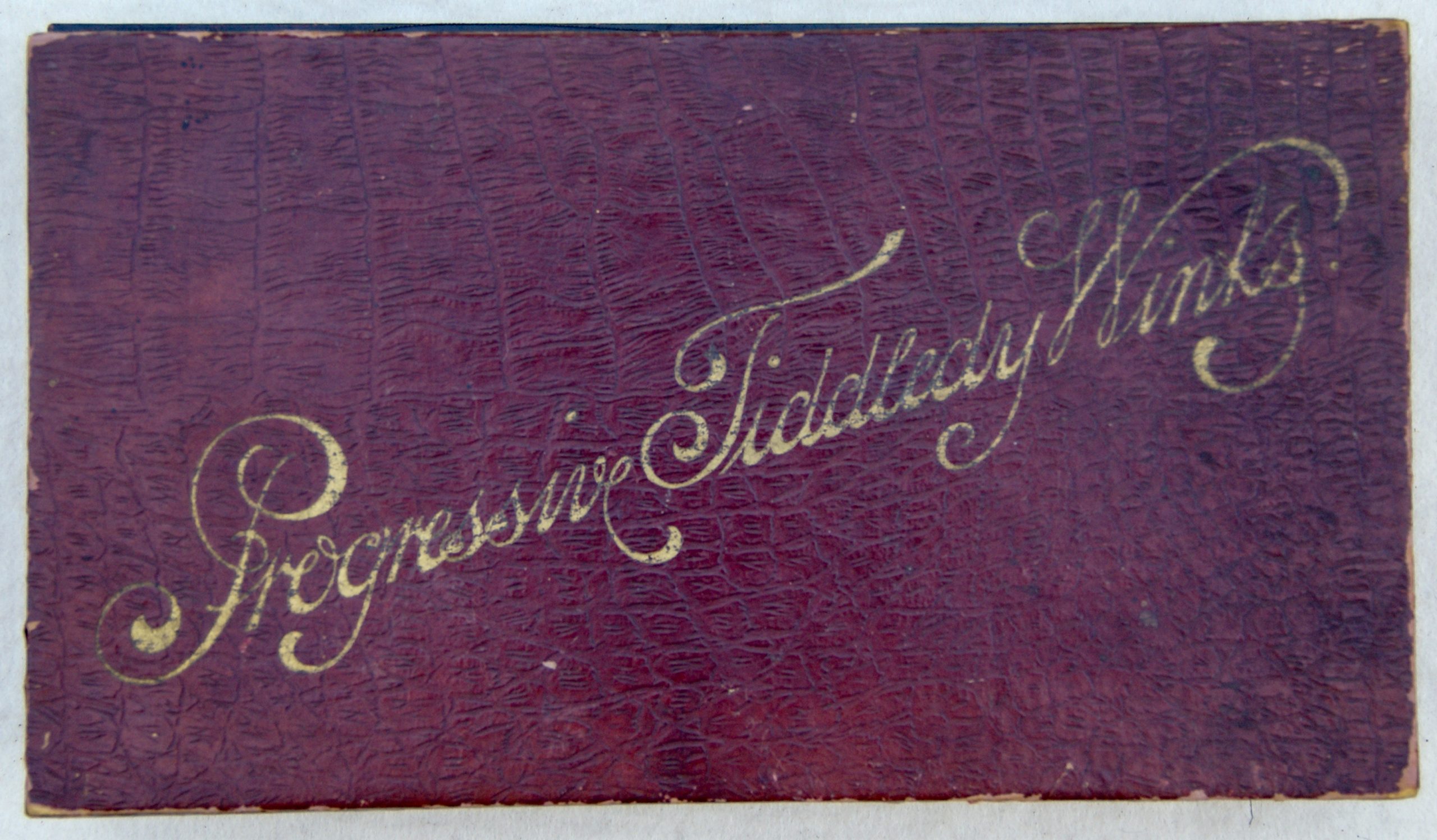 Tucker Tw ID • MCL-08 — publisher • McLoughlin Bros. — title • Progressive Tiddledy Winks