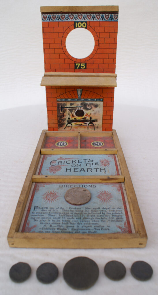Tucker Tw ID • SRI-03c1 — AGPI ID • G-29965c1 — publisher • Selchow and Righter (not marked) — title • CRICKETS ON THE HEARTH — notes • Wooden base and vertical stand, not in a box. — keywords • Selchow & Righter, article-1891-selchow-righter, game, game instructions, publisher