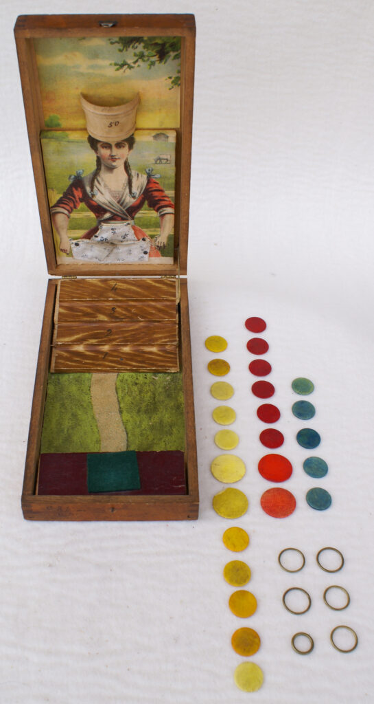 Tucker Tw ID • SRI-13c2 — AGPI ID • G-30046c2 — publisher • Selchow & Righter (unmarked, job — title • MILK MAID — notes • Wooden box with hinged top. — keywords • Selchow & Righter, game, publisher