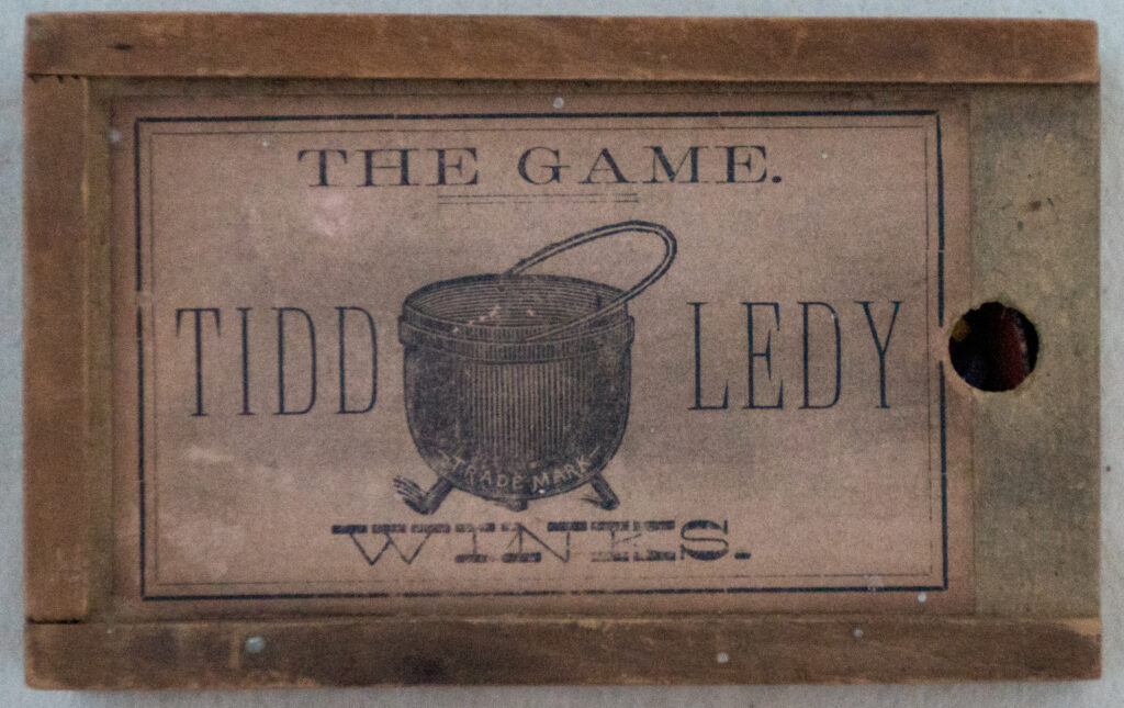 Tucker Tw ID • UNK-084c2 — publisher • (Unknown manufacturer) — title • THE GAME. TIDDLEDY WINKS.