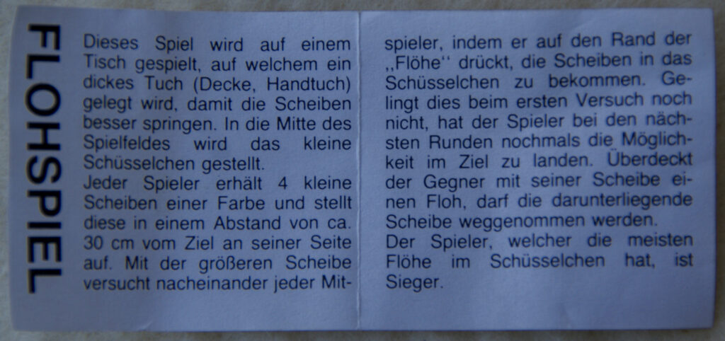 Tucker Tw ID • UNK-165c1 — publisher • (unknown, German) — title • FLOHSPIEL (on rules, not container)